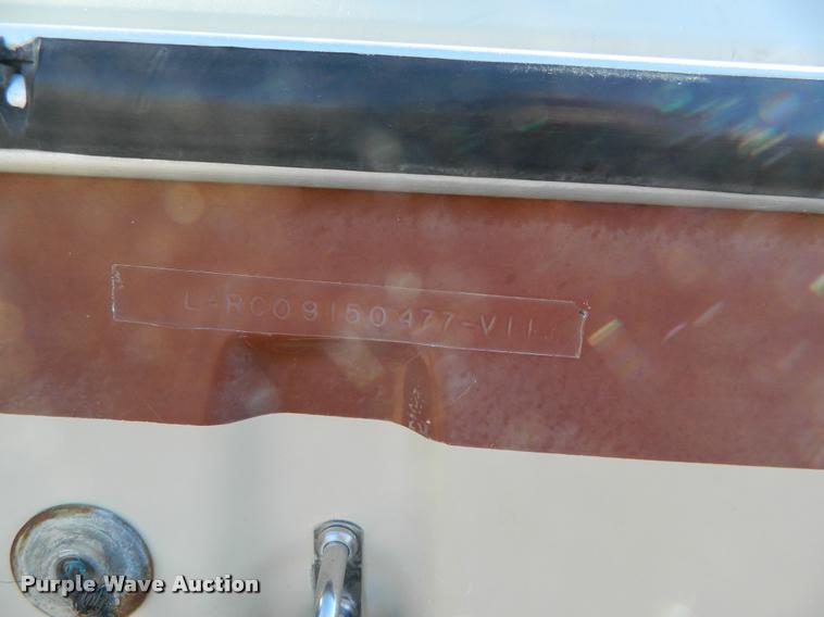 image for item J5050 1977 Larson fiberglass V-bottom boat