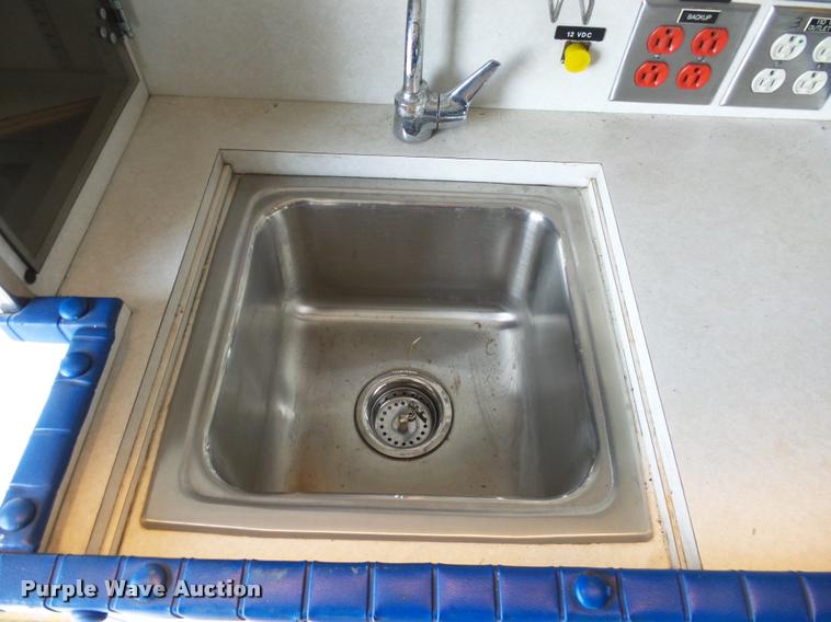 image for item K1016 1990 GMC TopKick 7000 ambulance