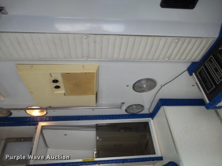 image for item K1016 1990 GMC TopKick 7000 ambulance