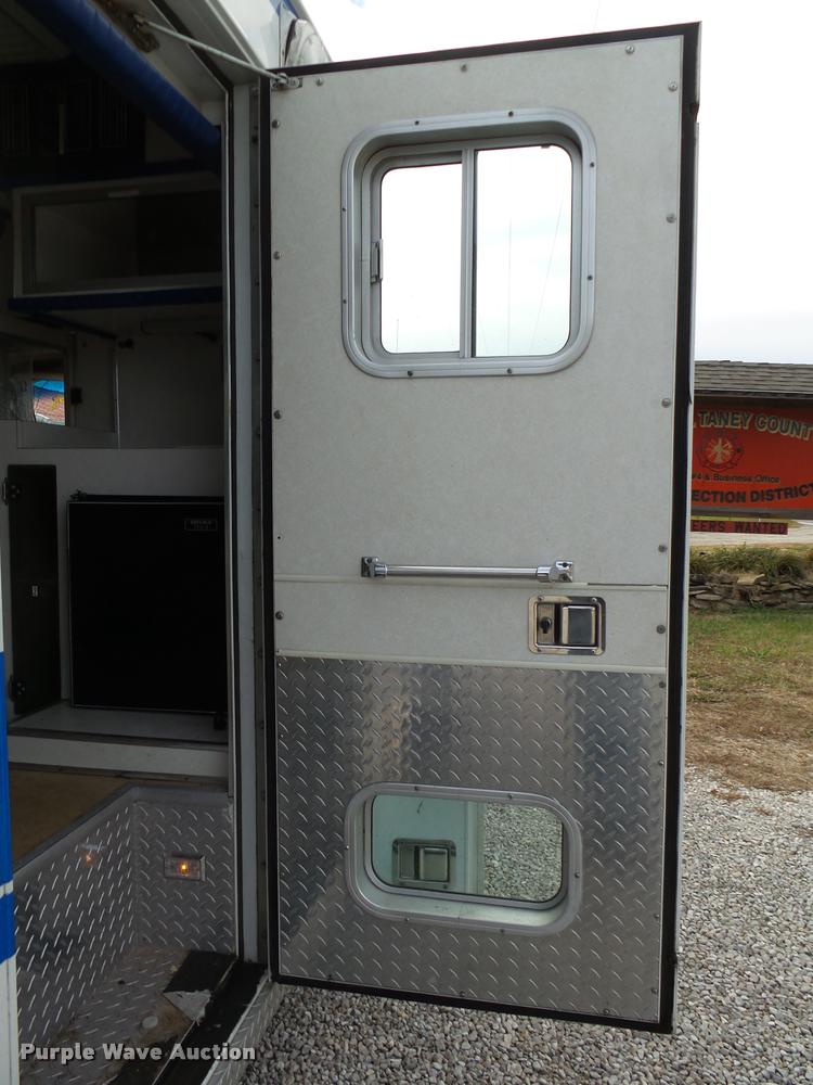 image for item K1016 1990 GMC TopKick 7000 ambulance