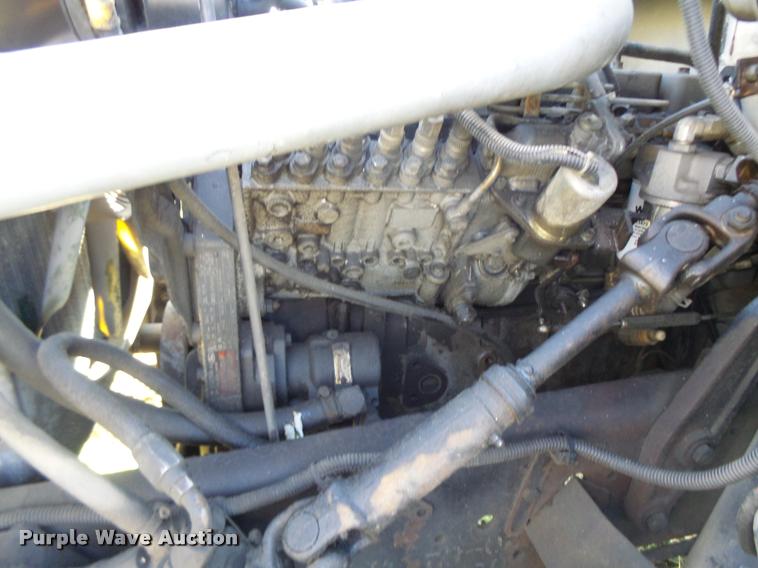 image for item K5517 1992 Ford F700 flatbed truck