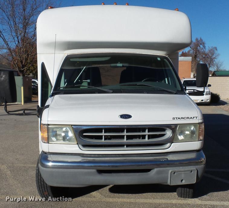 image for item K8046 2002 Ford Econoline E350 Super Duty Startcarft Coach shuttle bus