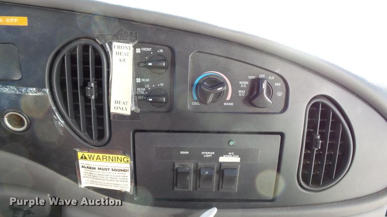 image for item K8046 2002 Ford Econoline E350 Super Duty Startcarft Coach shuttle bus