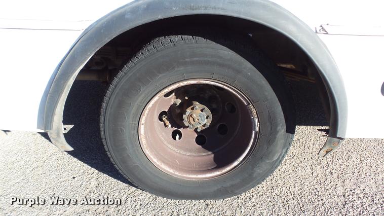 image for item K8046 2002 Ford Econoline E350 Super Duty Startcarft Coach shuttle bus