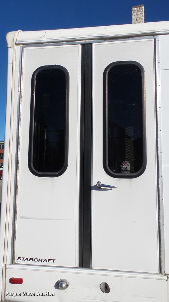 image for item K8046 2002 Ford Econoline E350 Super Duty Startcarft Coach shuttle bus