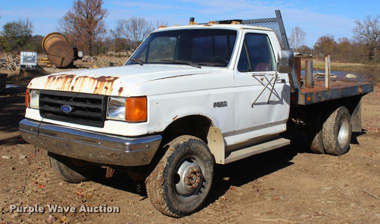 image for item L4920 1987 Ford F350 flatbed pickup truck