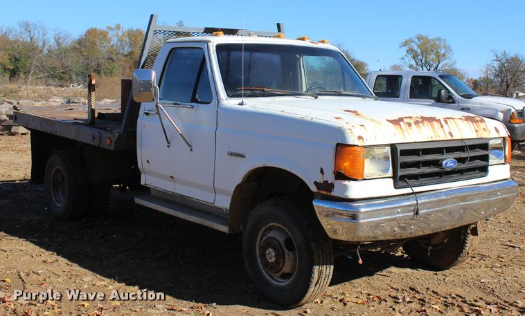 image for item L4920 1987 Ford F350 flatbed pickup truck