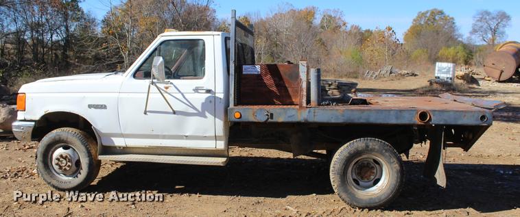 image for item L4920 1987 Ford F350 flatbed pickup truck