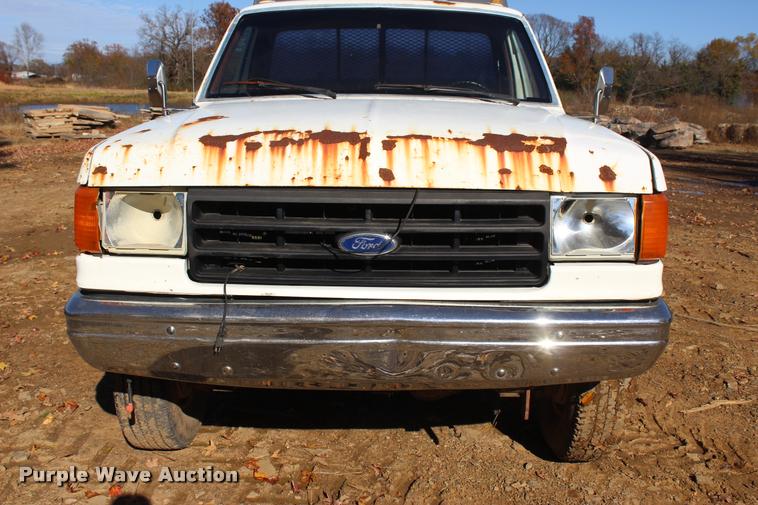 image for item L4920 1987 Ford F350 flatbed pickup truck