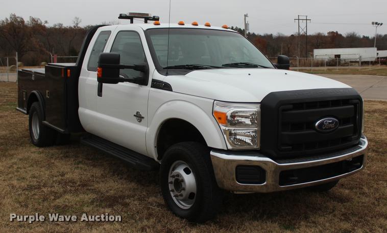 image for item L4935 2012 Ford F350 Super Duty XL SuperCab flatbed pickup truck