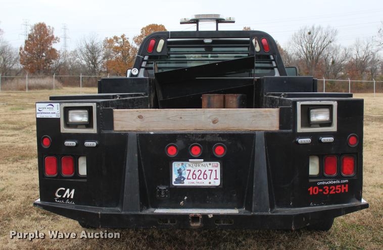 image for item L4935 2012 Ford F350 Super Duty XL SuperCab flatbed pickup truck