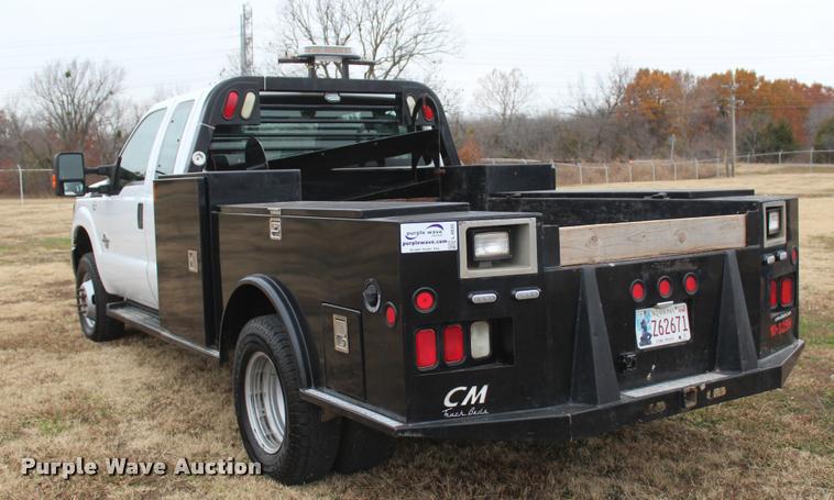 image for item L4935 2012 Ford F350 Super Duty XL SuperCab flatbed pickup truck