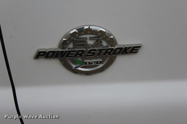 image for item L4935 2012 Ford F350 Super Duty XL SuperCab flatbed pickup truck