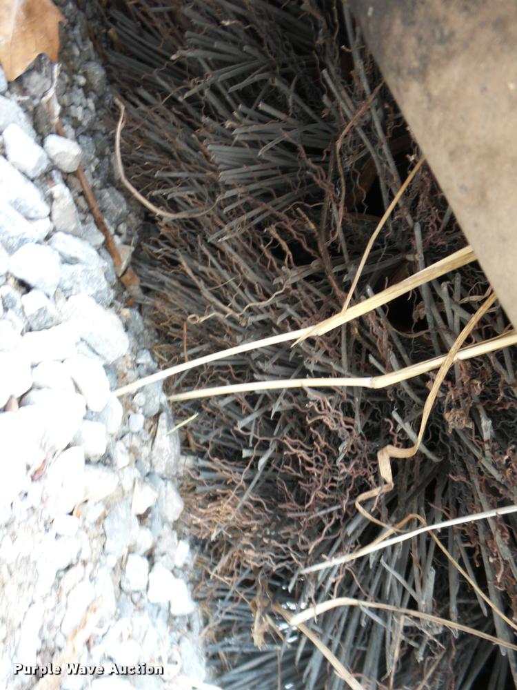 image for item AG9100 2007 Caterpillar BU118 skid steer broom