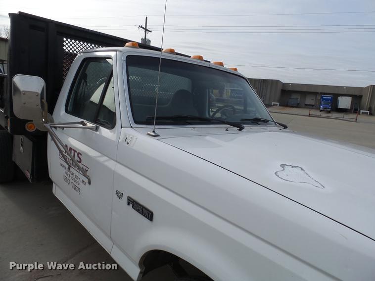 image for item AV9826 1996 Ford F450 Super Duty dump flatbed truck
