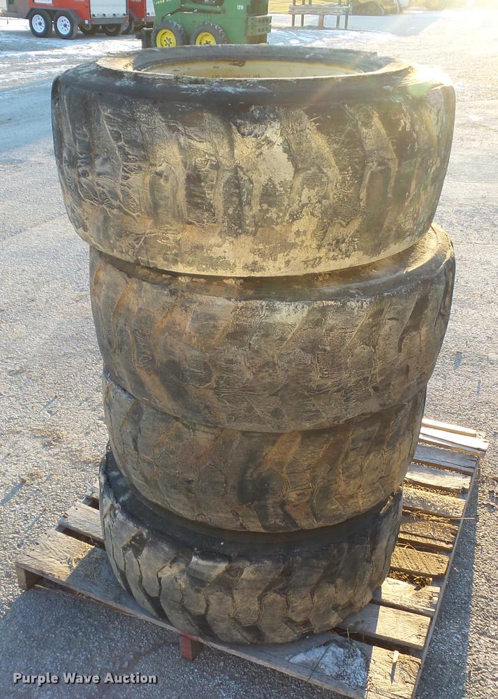 image for item BZ9961 (4) 12-16.5 NHS tires and wheels