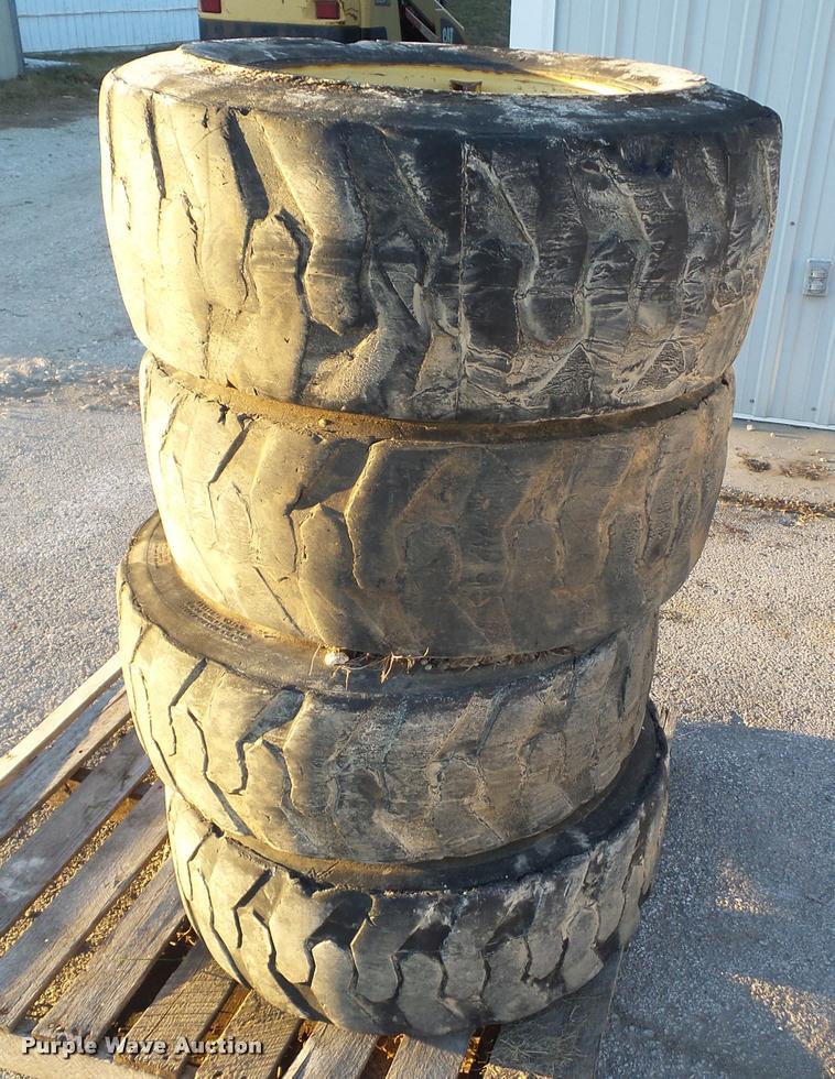 image for item BZ9961 (4) 12-16.5 NHS tires and wheels
