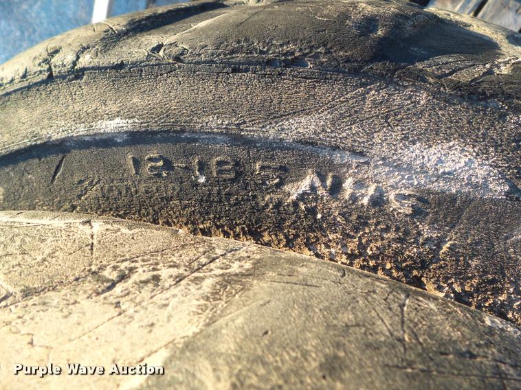 image for item BZ9961 (4) 12-16.5 NHS tires and wheels