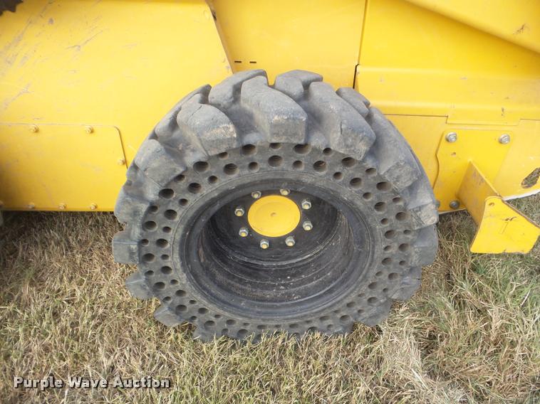 image for item DA5028 2008 John Deere 325 skid steer