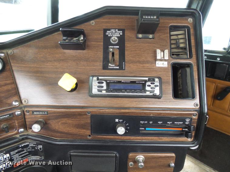 image for item J5460 1997 Freightliner FLD120SD flatbed truck