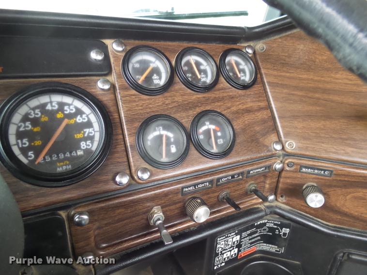 image for item J5460 1997 Freightliner FLD120SD flatbed truck