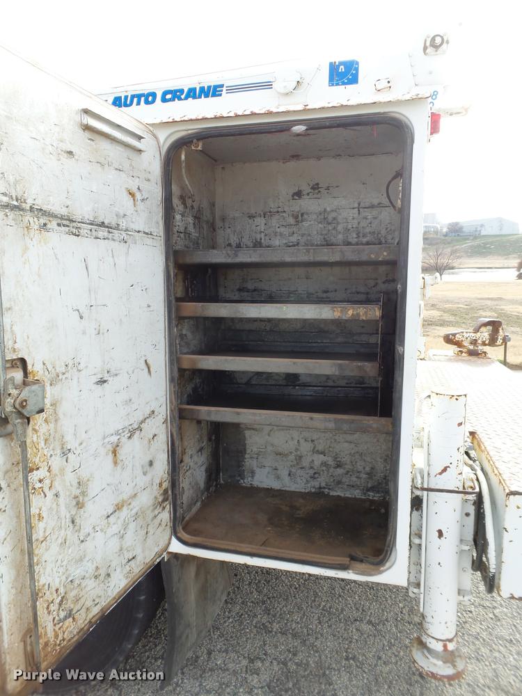 image for item L1746 2003 International DuraStar 4300 service truck with crane