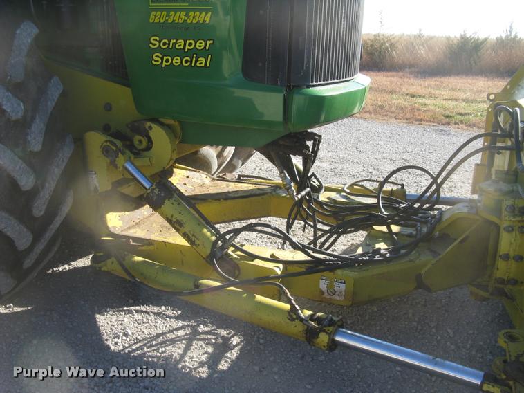 image for item L3920 2006 John Deere 9520 Scraper Special 4WD tractor
