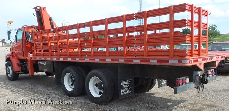 image for item L4184 1999 Sterling L8513 flatbed truck with crane