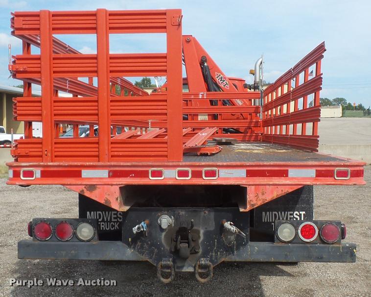image for item L4184 1999 Sterling L8513 flatbed truck with crane