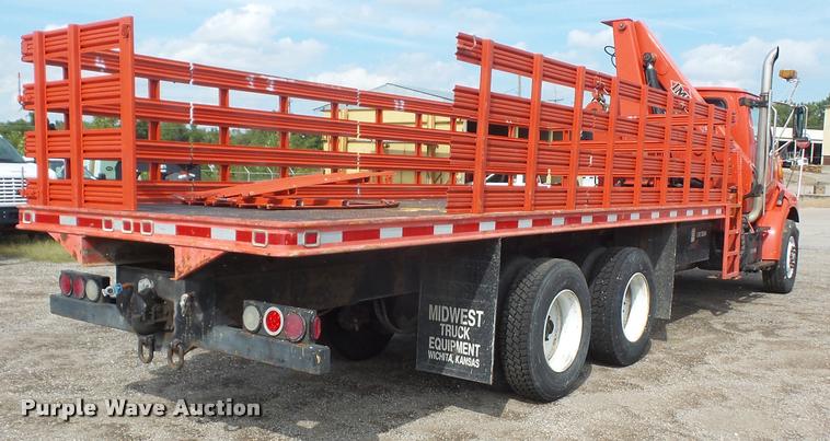 image for item L4184 1999 Sterling L8513 flatbed truck with crane