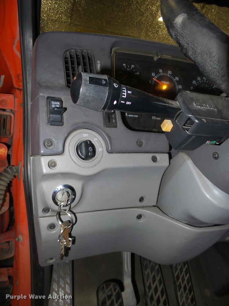 image for item L4184 1999 Sterling L8513 flatbed truck with crane