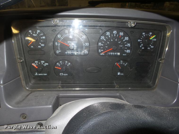 image for item L4184 1999 Sterling L8513 flatbed truck with crane