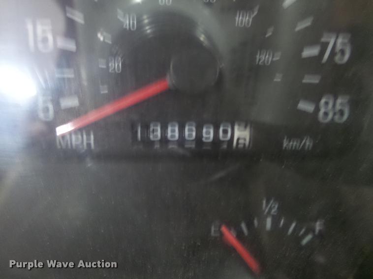 image for item L4184 1999 Sterling L8513 flatbed truck with crane