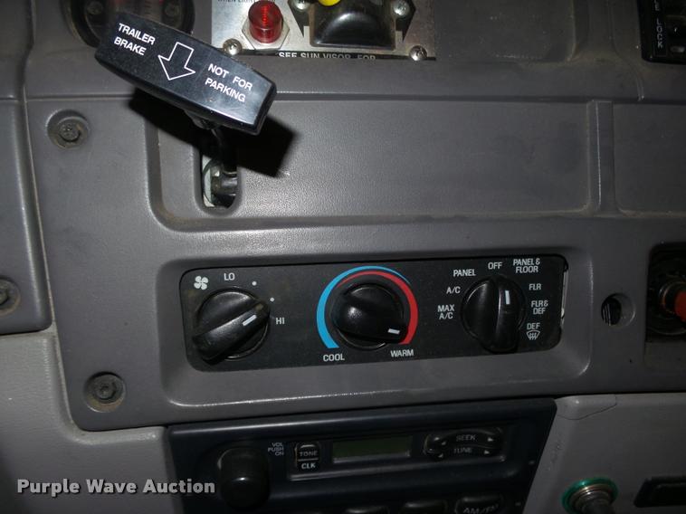 image for item L4184 1999 Sterling L8513 flatbed truck with crane