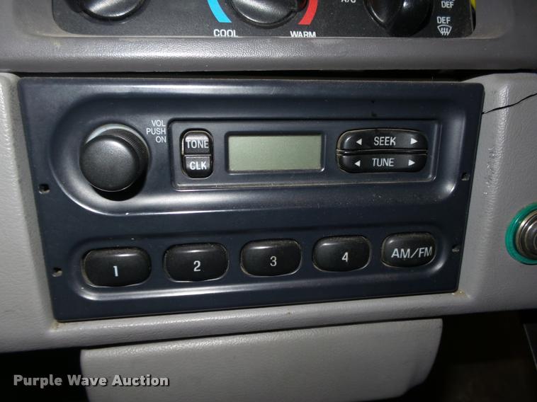 image for item L4184 1999 Sterling L8513 flatbed truck with crane