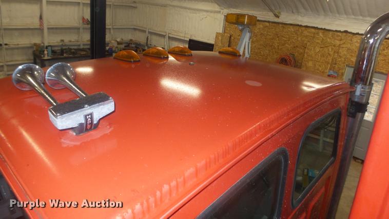 image for item L4184 1999 Sterling L8513 flatbed truck with crane