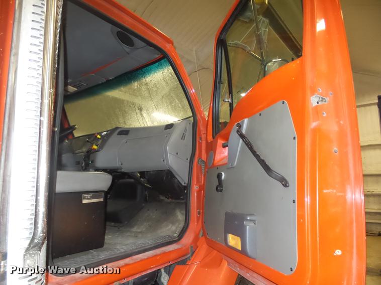 image for item L4184 1999 Sterling L8513 flatbed truck with crane