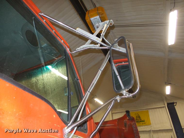 image for item L4184 1999 Sterling L8513 flatbed truck with crane