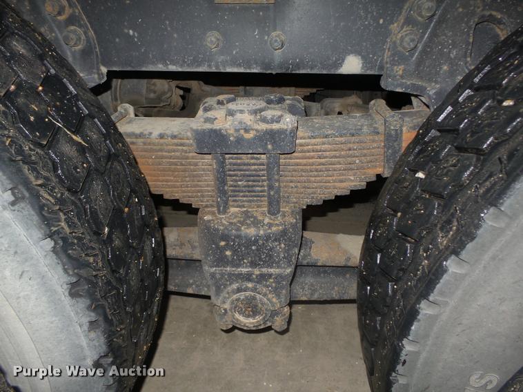 image for item L4184 1999 Sterling L8513 flatbed truck with crane