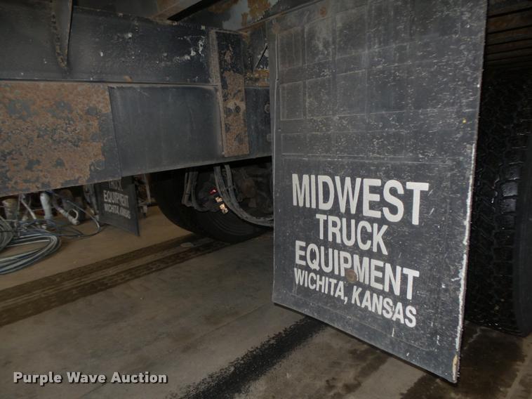 image for item L4184 1999 Sterling L8513 flatbed truck with crane