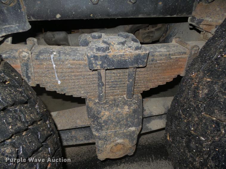 image for item L4184 1999 Sterling L8513 flatbed truck with crane