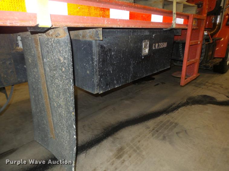 image for item L4184 1999 Sterling L8513 flatbed truck with crane