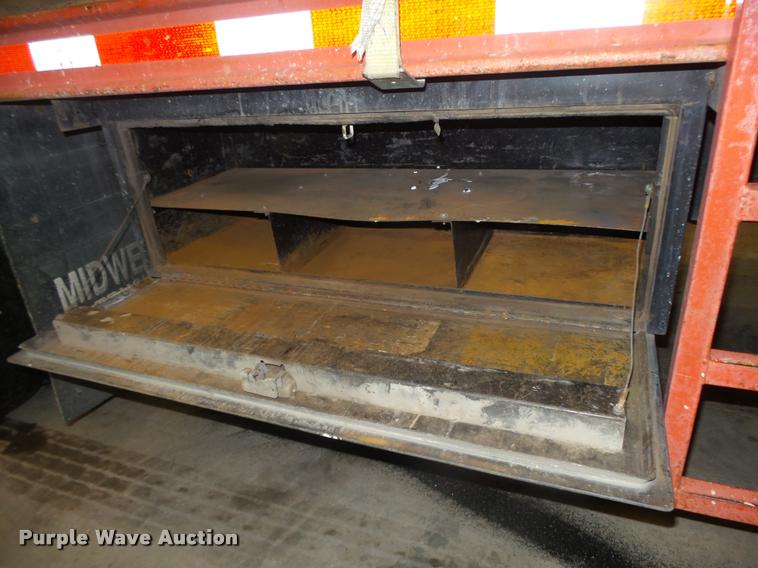 image for item L4184 1999 Sterling L8513 flatbed truck with crane