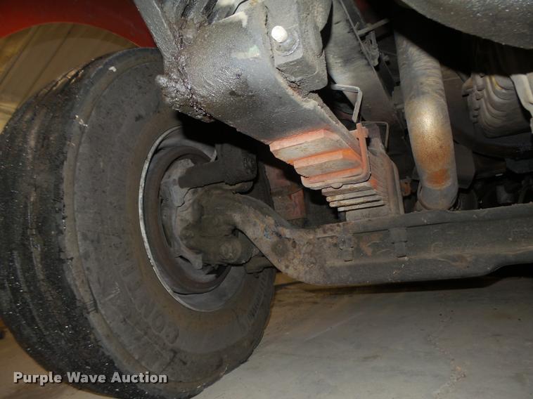 image for item L4184 1999 Sterling L8513 flatbed truck with crane