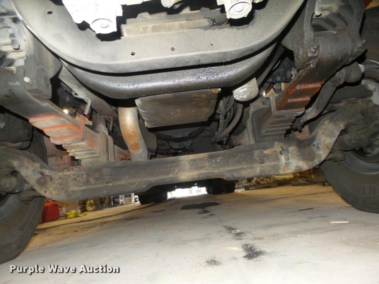 image for item L4184 1999 Sterling L8513 flatbed truck with crane