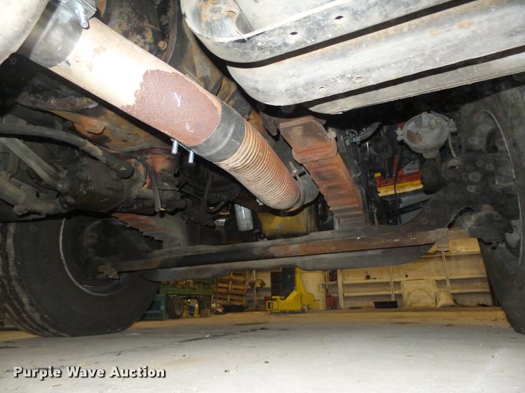 image for item L4184 1999 Sterling L8513 flatbed truck with crane