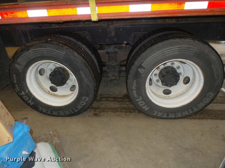 image for item L4184 1999 Sterling L8513 flatbed truck with crane