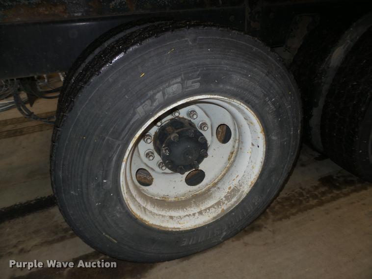 image for item L4184 1999 Sterling L8513 flatbed truck with crane