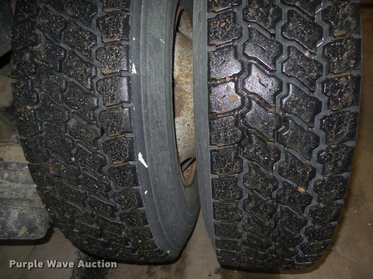 image for item L4184 1999 Sterling L8513 flatbed truck with crane