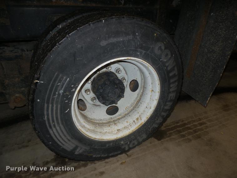 image for item L4184 1999 Sterling L8513 flatbed truck with crane